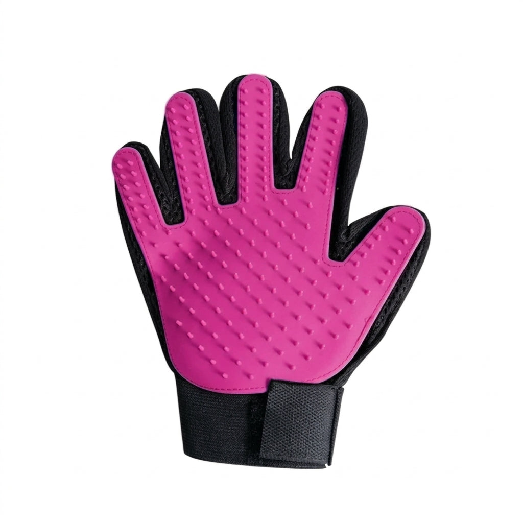 Gant de toilettage en silicone pour chien et chat main droite de couleur rose.